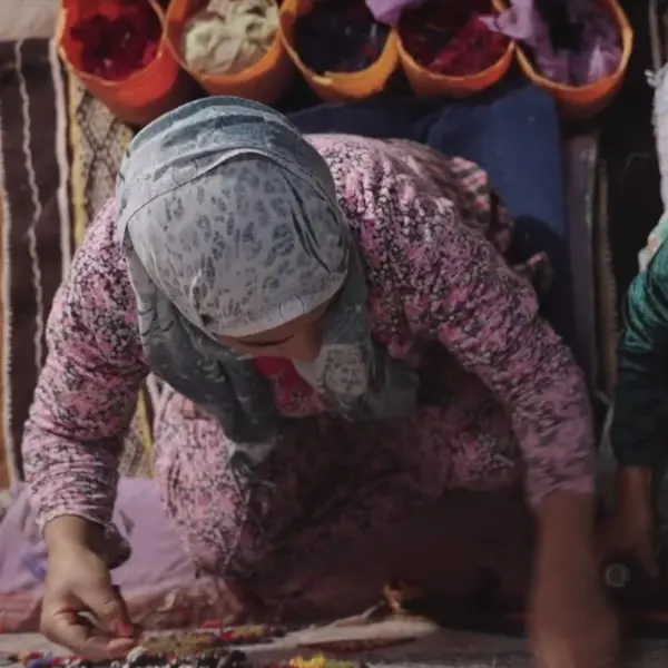 Artisans at loom