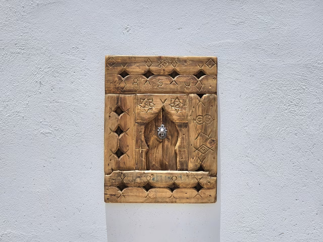 Amazigh Carved Wood Wall Panel 67×52 cm – Arch with Diamond Cut-Outs