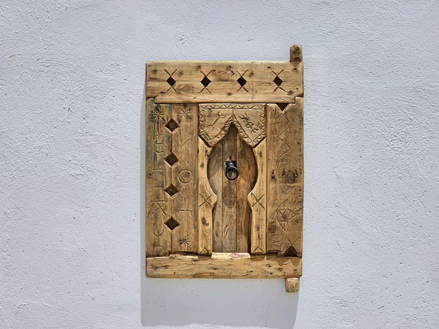 Amazigh Carved Wood Wall Panel 77×56 cm – Arched Door Motif